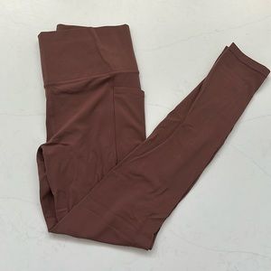 Athleta powervita salutation leggings with pockets